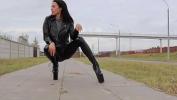 หนัง18 Brunette wearing tight leather leggings comma high heels and a leather biker jacket ล่าสุด