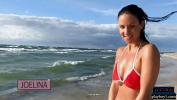 หนังเอ็ก German MILF model Joelina strips naked on the beach 2024