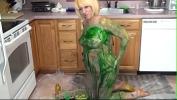 หนังav Blonde in kitchen rubs green paint over her tits and ass 3gp